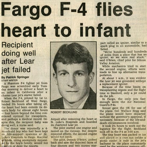 Vintage news clipping with the headline, "Fargo F-4 Flies Heart to Infant"