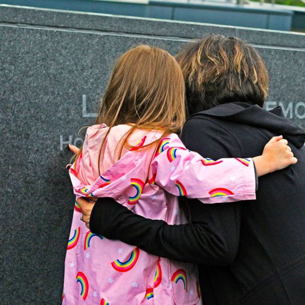 Mother and daughter at the LifeSource memorial wall
